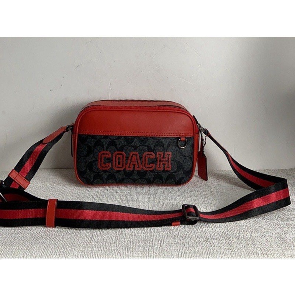 Graham Crossbody In Signature Canvas With Varsity
Motif-Gently used